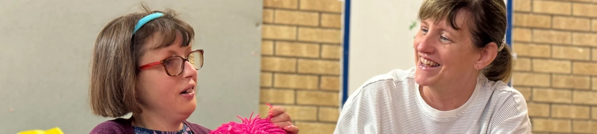 two ladies facing each other. happy